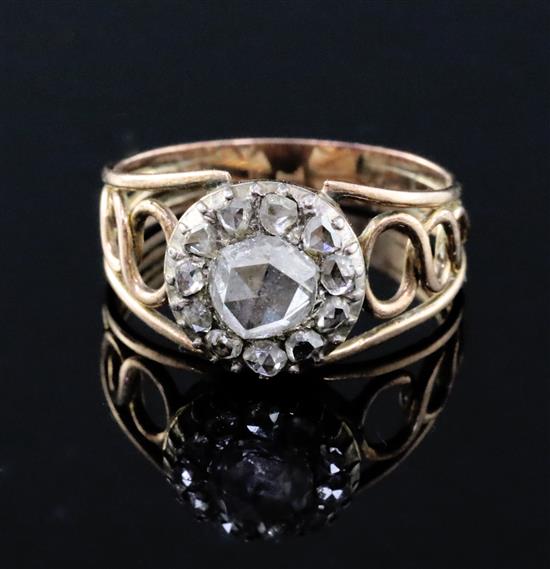 A Georgian gold, silver and rose cut diamond set cluster dress ring, size M.